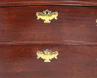 A Fine Chippendale Mahogany Diminutive Reverse-Serpentine Chest of Drawers