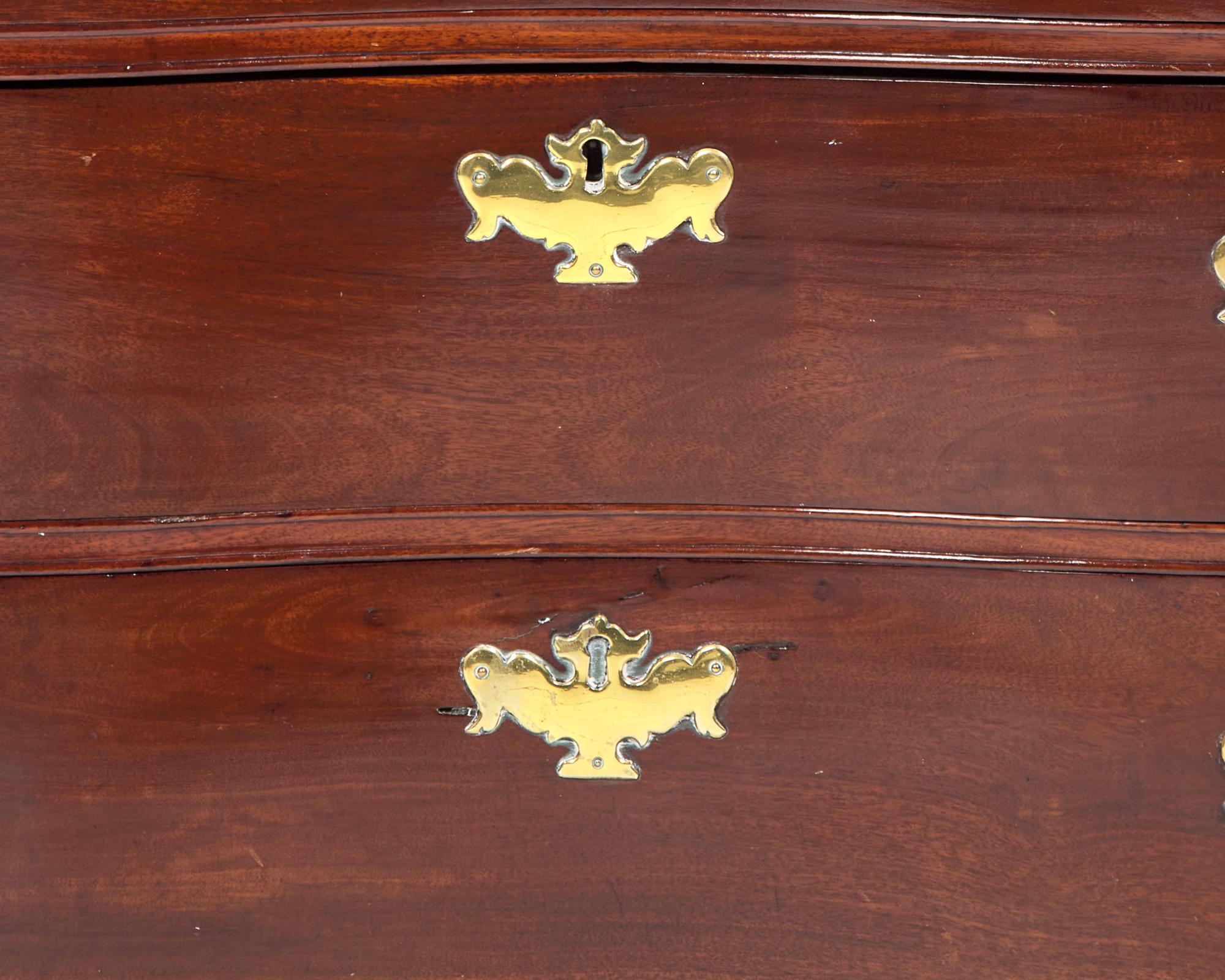 A Fine Chippendale Mahogany Diminutive Reverse-Serpentine Chest of Drawers