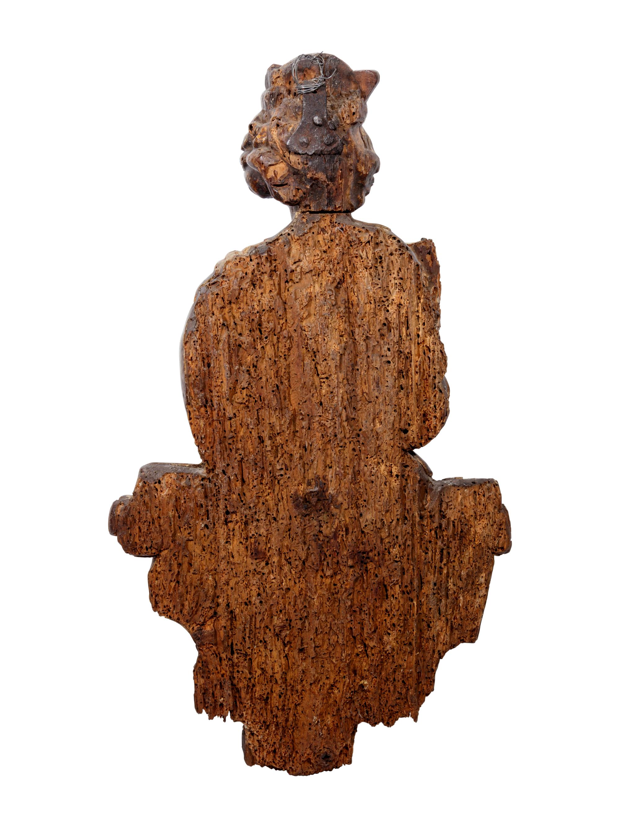 A Continental Carved and Painted Figure of King David Playing the Harp