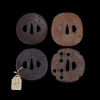 Group of twelve assorted Japanese iron tsuba