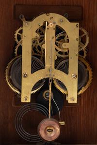 An Ansonia Cabinet A Brass Mounted Oak Shelf Clock