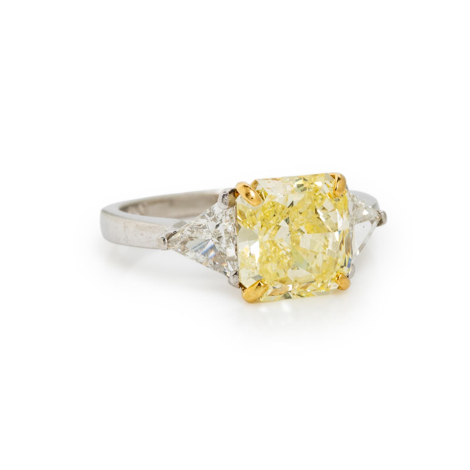 FANCY YELLOW DIAMOND, DIAMOND, AND PLATINUM RING