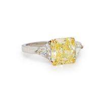FANCY YELLOW DIAMOND, DIAMOND, AND PLATINUM RING