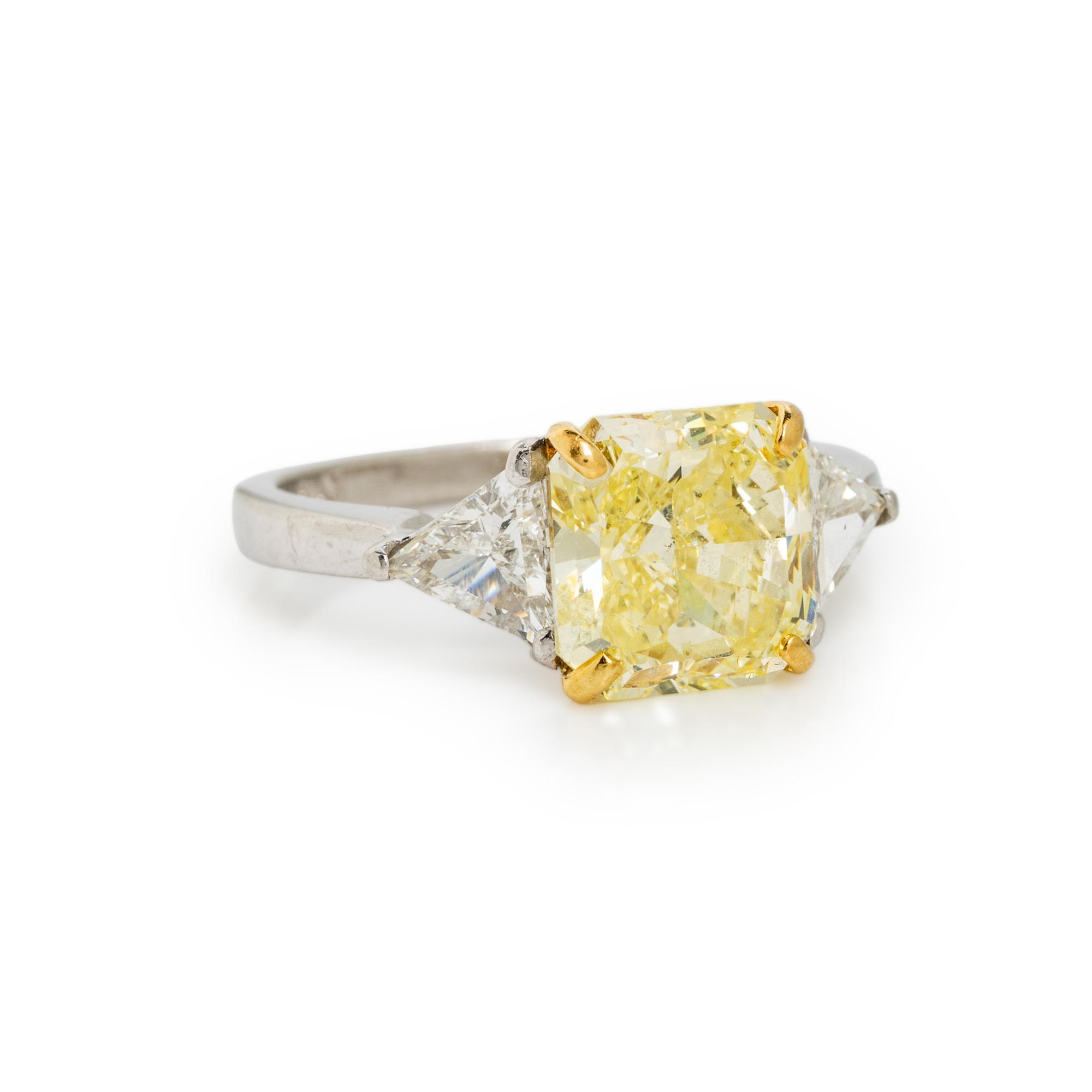FANCY YELLOW DIAMOND, DIAMOND, AND PLATINUM RING