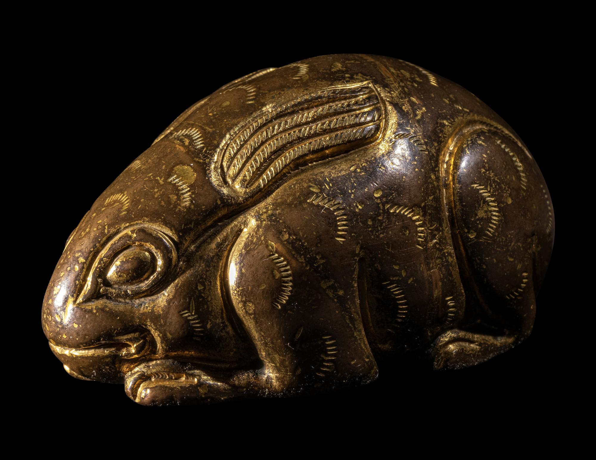 A Chinese Parcel Gilt Bronze Rabbit-Form Paper Weight