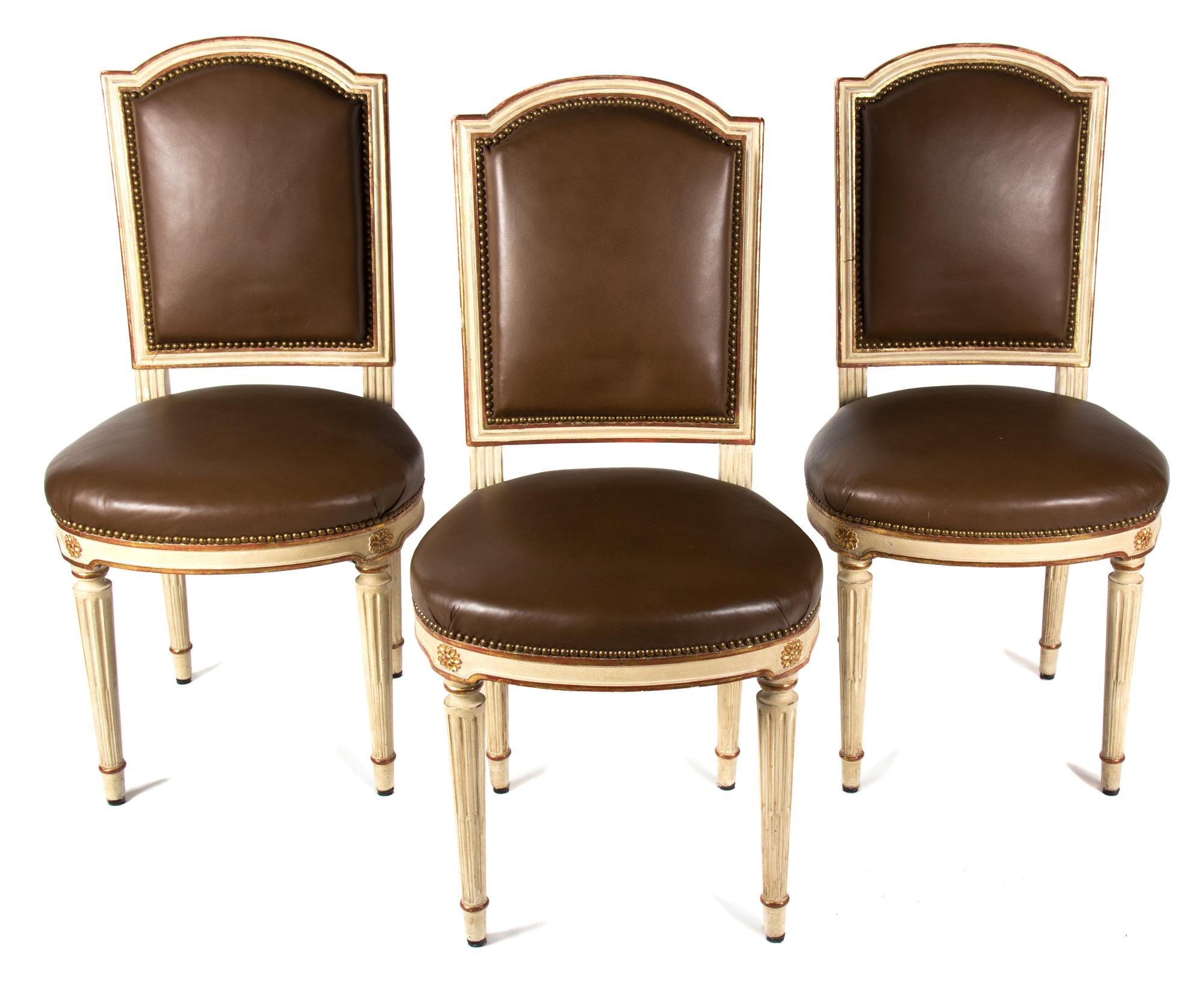 A Set of Eight Louis XVI Style Carved and Painted Side Chairs Height 38 inches. — LATE 19TH CENTURY