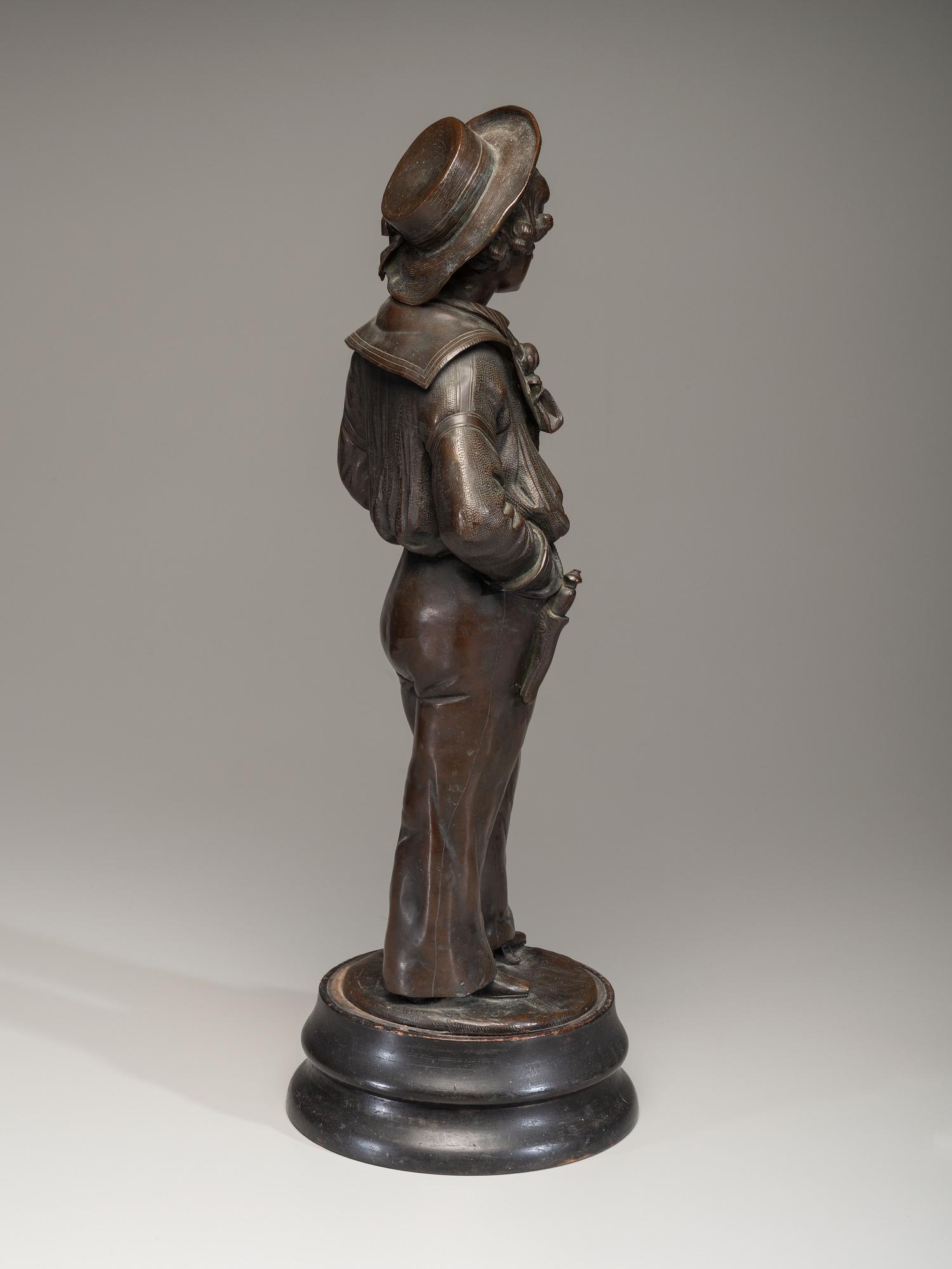 A Cast Bronze Figure of a Sailor Boy