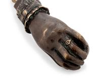 A Pair of Bronze Hand-and-Ball Door Knockers