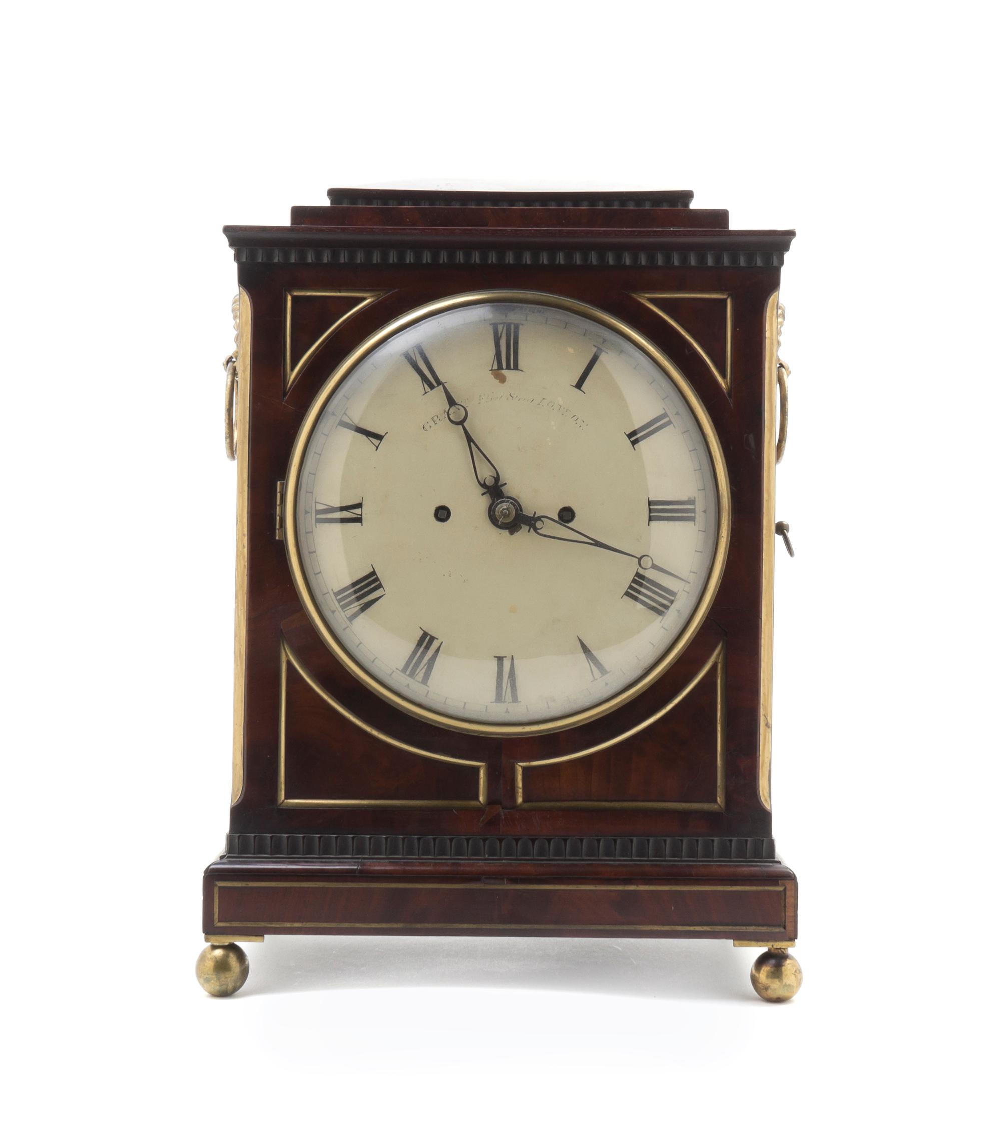 A Regency Brass Mounted Mahogany Bracket Clock, GRANT, LONDON, CIRCA 1910-1915, Height 16 x width 11 1/4 x depth 6 1/2 inches. — GRANT, LONDON, CIRCA 1910-1915,