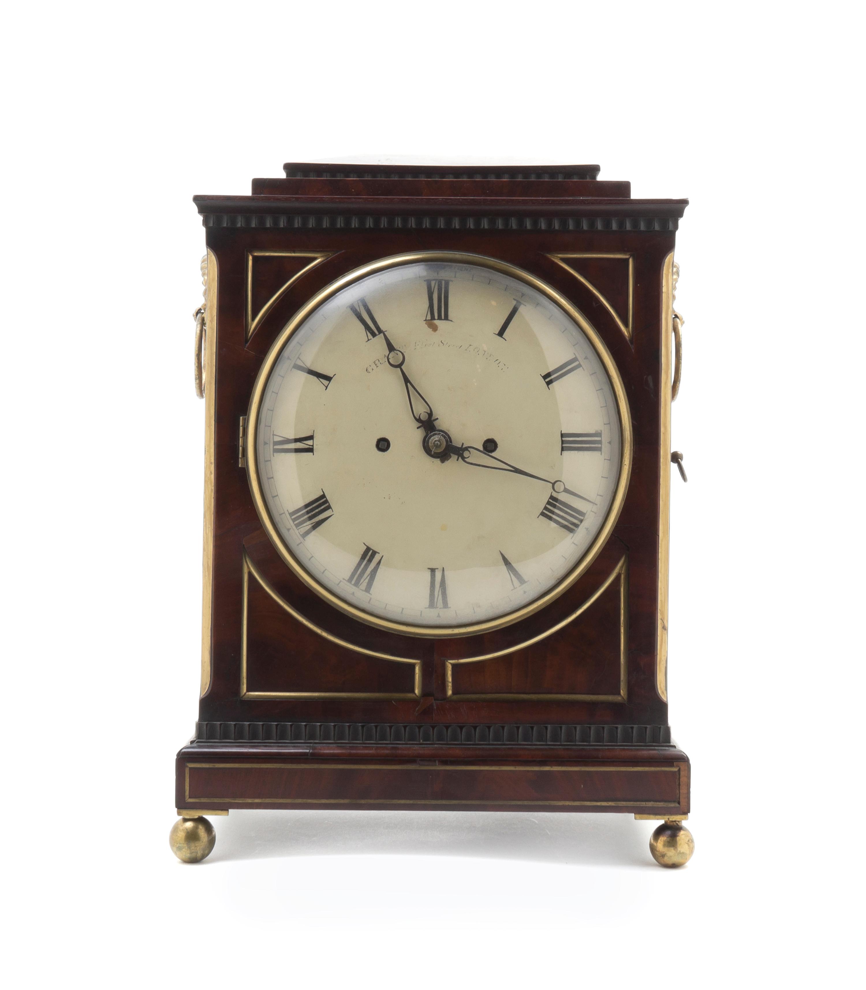 A Regency Brass Mounted Mahogany Bracket Clock, GRANT, LONDON, CIRCA 1910-1915, Height 16 x width 11 1/4 x depth 6 1/2 inches. — GRANT, LONDON, CIRCA 1910-1915,