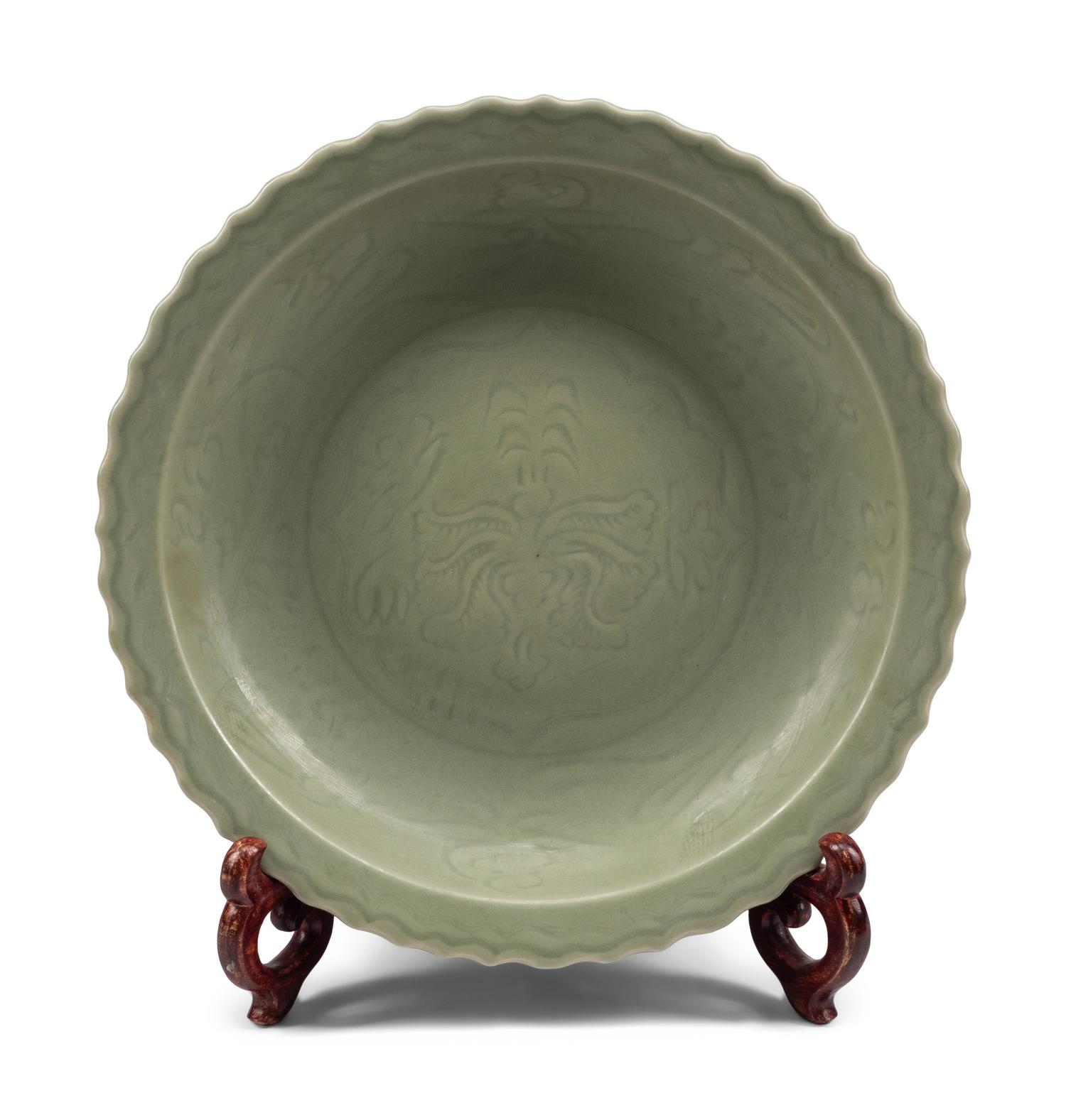 A Chinese Celadon Glazed Porcelain Charger