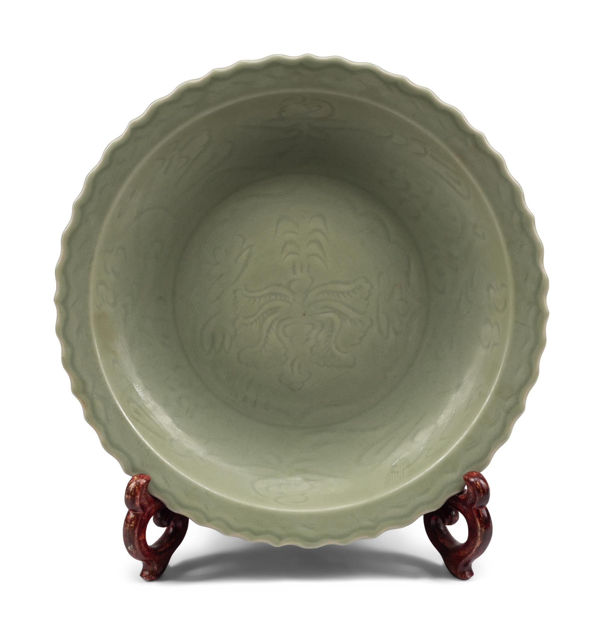 A Chinese Celadon Glazed Porcelain Charger