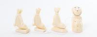 A Collection of Four Walrus Tusk Figures Height 2 1/4 inches. — 20TH CENTURY