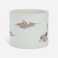 A Chinese underglaze red-decorated porcelain brush pot 釉里红画山水笔筒