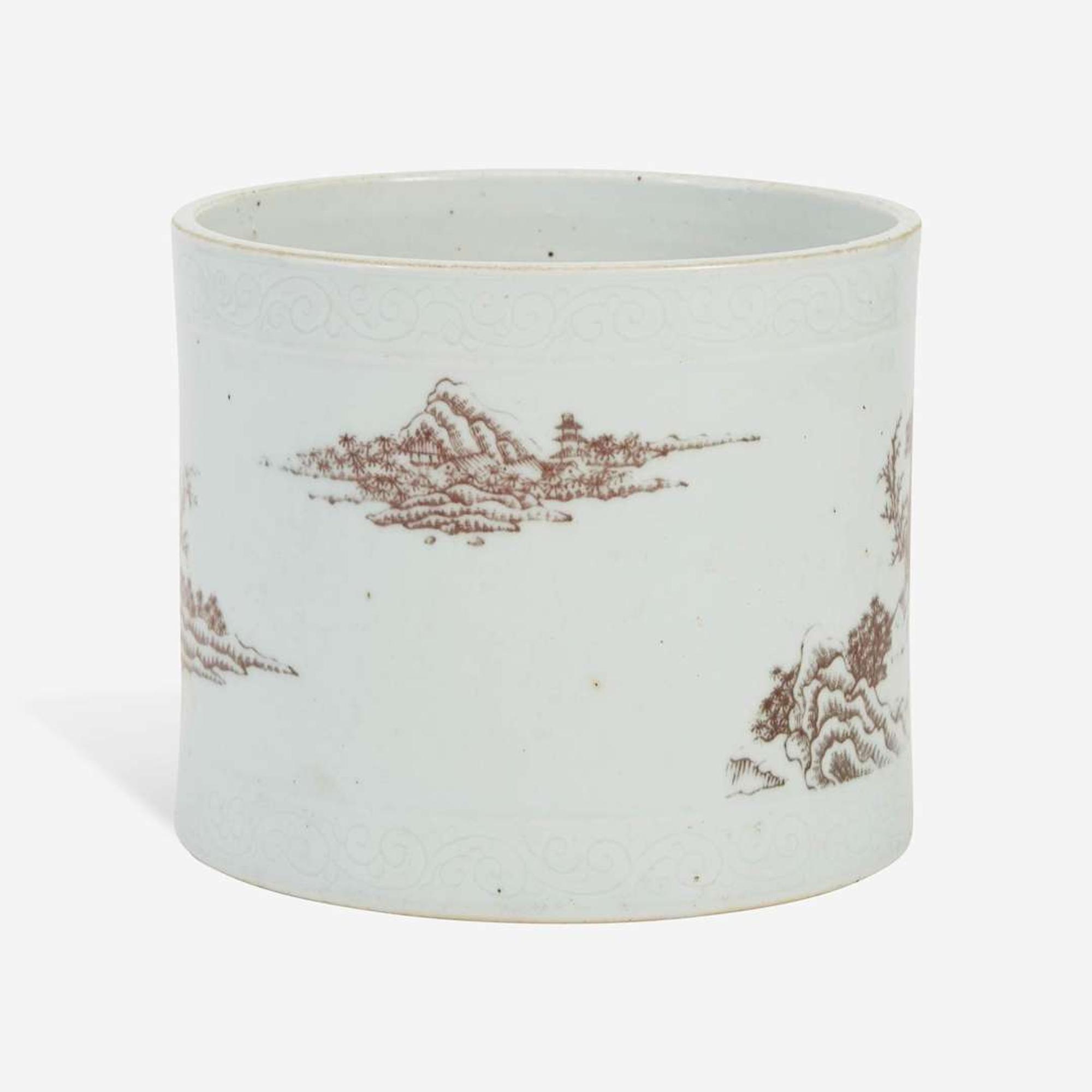 A Chinese underglaze red-decorated porcelain brush pot 釉里红画山水笔筒