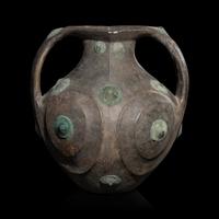 A Chinese Grey Pottery Amphora with Metal Boss Appliques, Western Han Dynasty — 西漢 黑陶嵌铜泡钉双耳壶