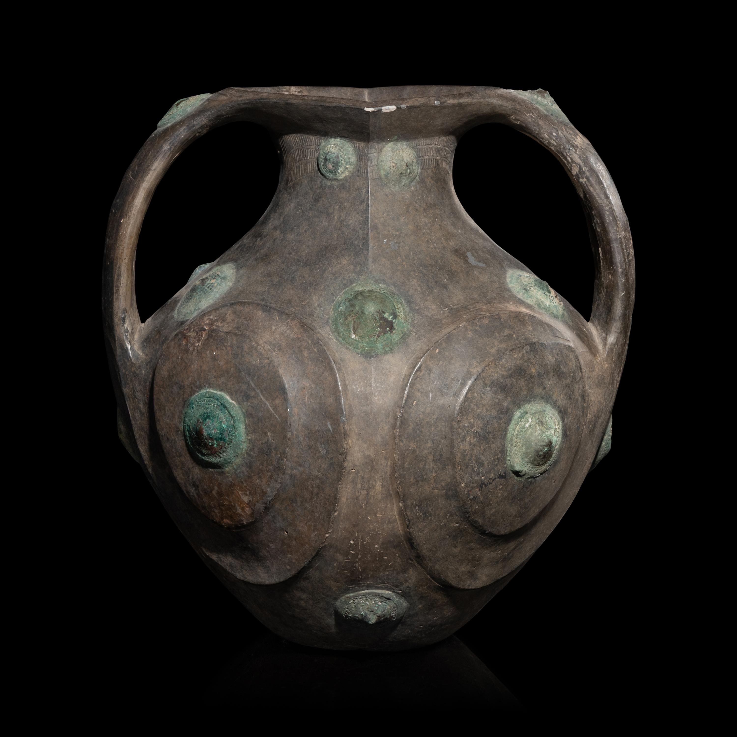 A Chinese Grey Pottery Amphora with Metal Boss Appliques, Western Han Dynasty — 西漢 黑陶嵌铜泡钉双耳壶