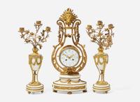 A French Louis XVI style three-piece gilt bronze and white marble clock garniture, retailed by Tiffany & Co., New York, NY, late 19th century