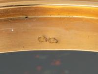 A George III Gold and Jewel Mounted Carved Bloodstone Clock-Inset Snuff Box