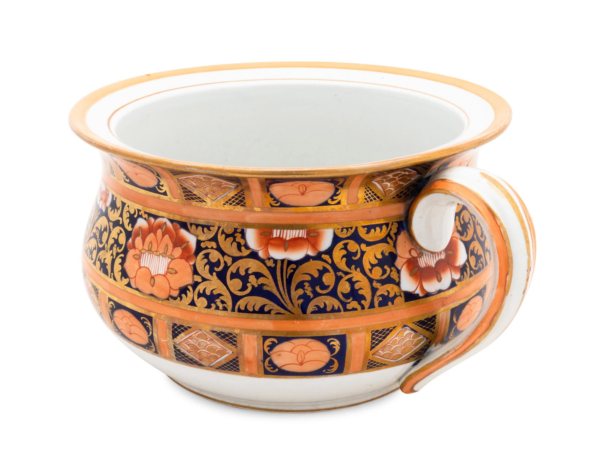 A Pair of English Ironstone Painted and Parcel Gilt Chamber Pots