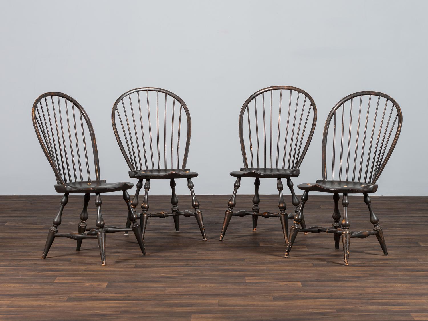 A Set of Four D.R. Dimes Black-Painted Hoop-Back Compass-Seat Windsor Chairs