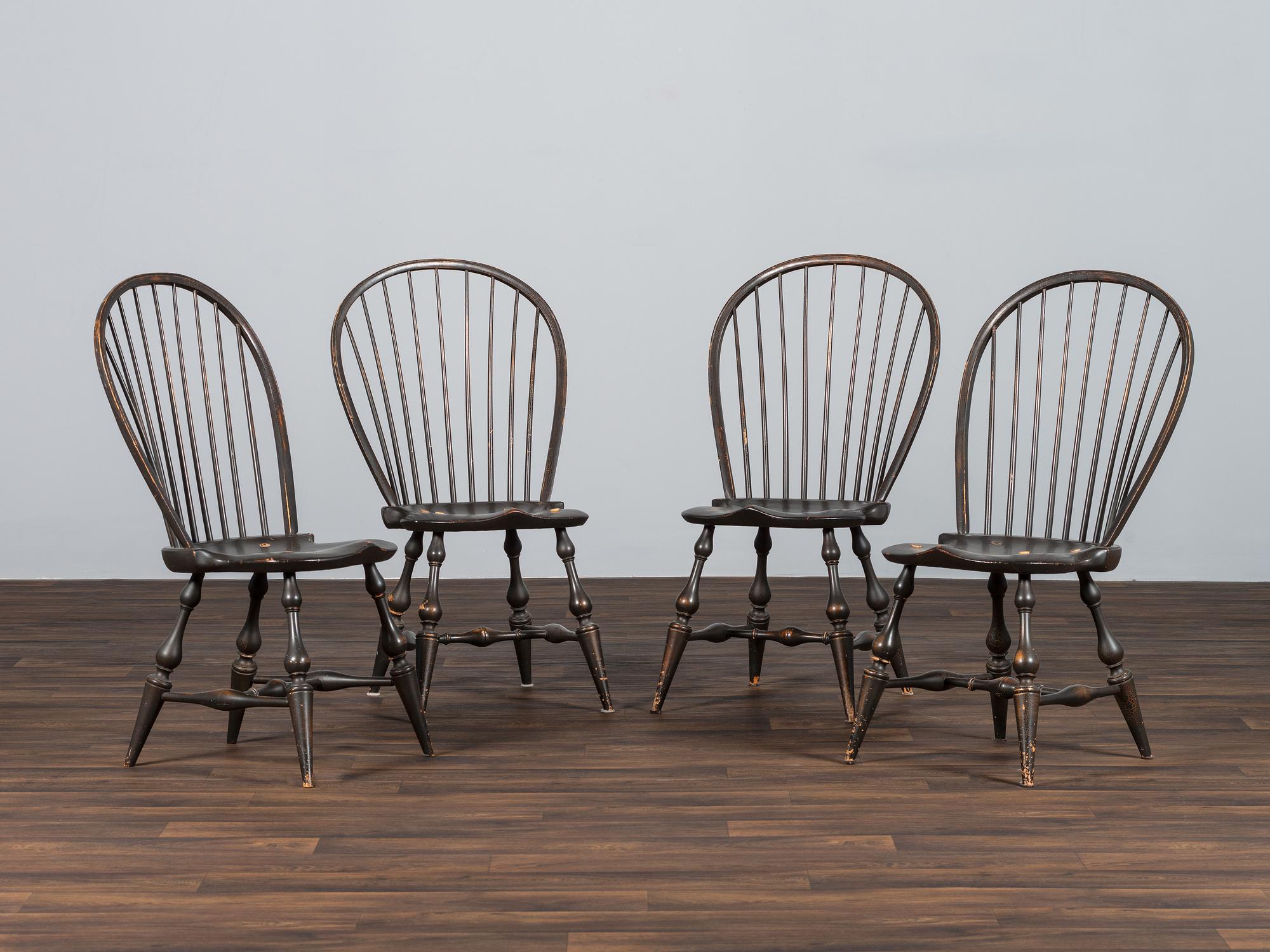 A Set of Four D.R. Dimes Black-Painted Hoop-Back Compass-Seat Windsor Chairs