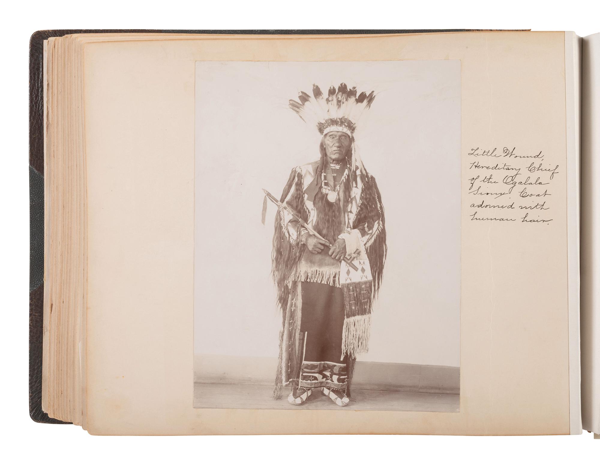 Exceptional album containing photographs of Pine Ridge Reservation and its surroundings, incl. Native American subjects, Indian schools, ceremonies, camp life, and Wounded Knee. Ca late 1890s-early 1900s.