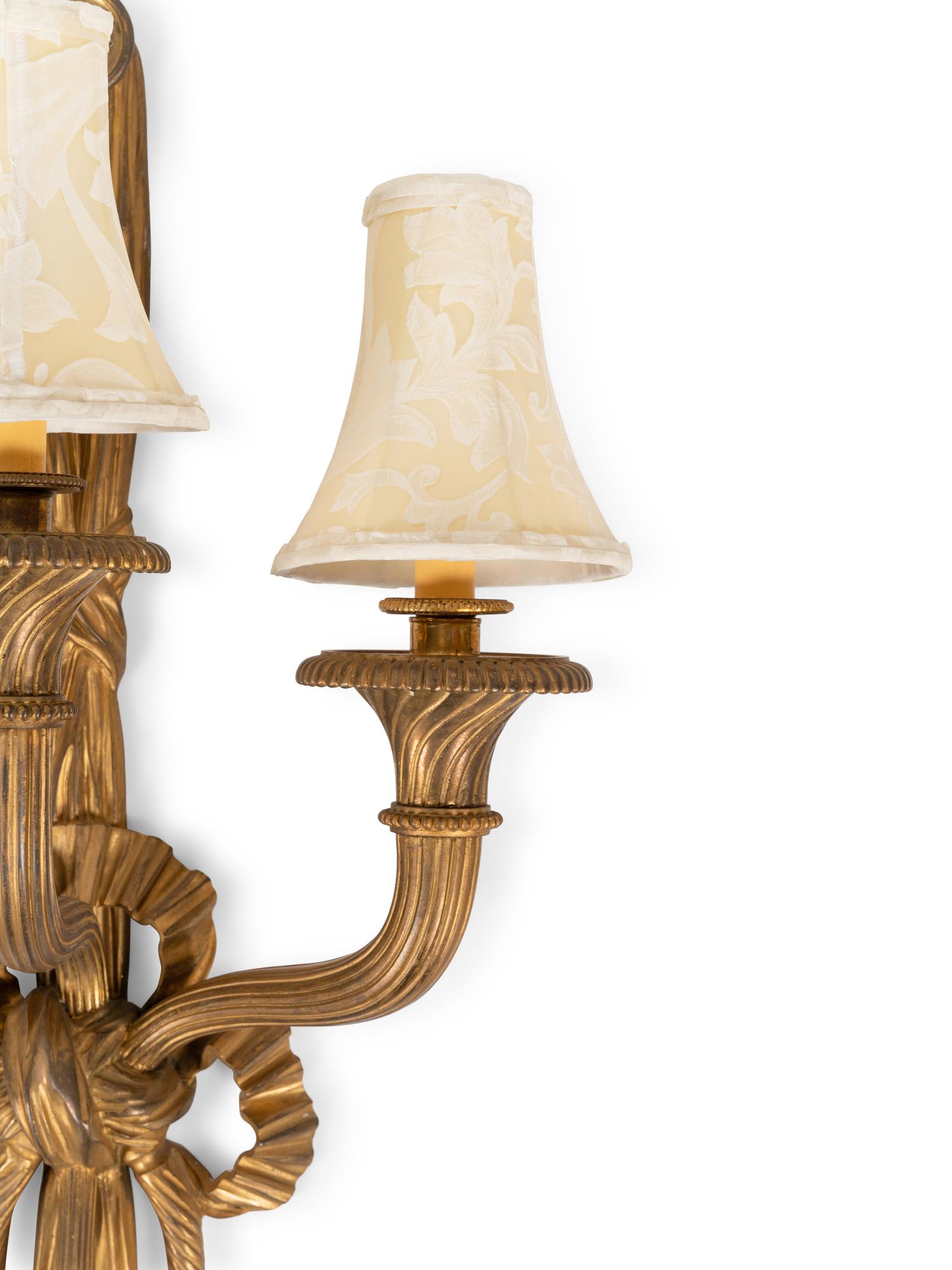 A Pair of Louis XVI Style Gilt Bronze Three-Light Sconces