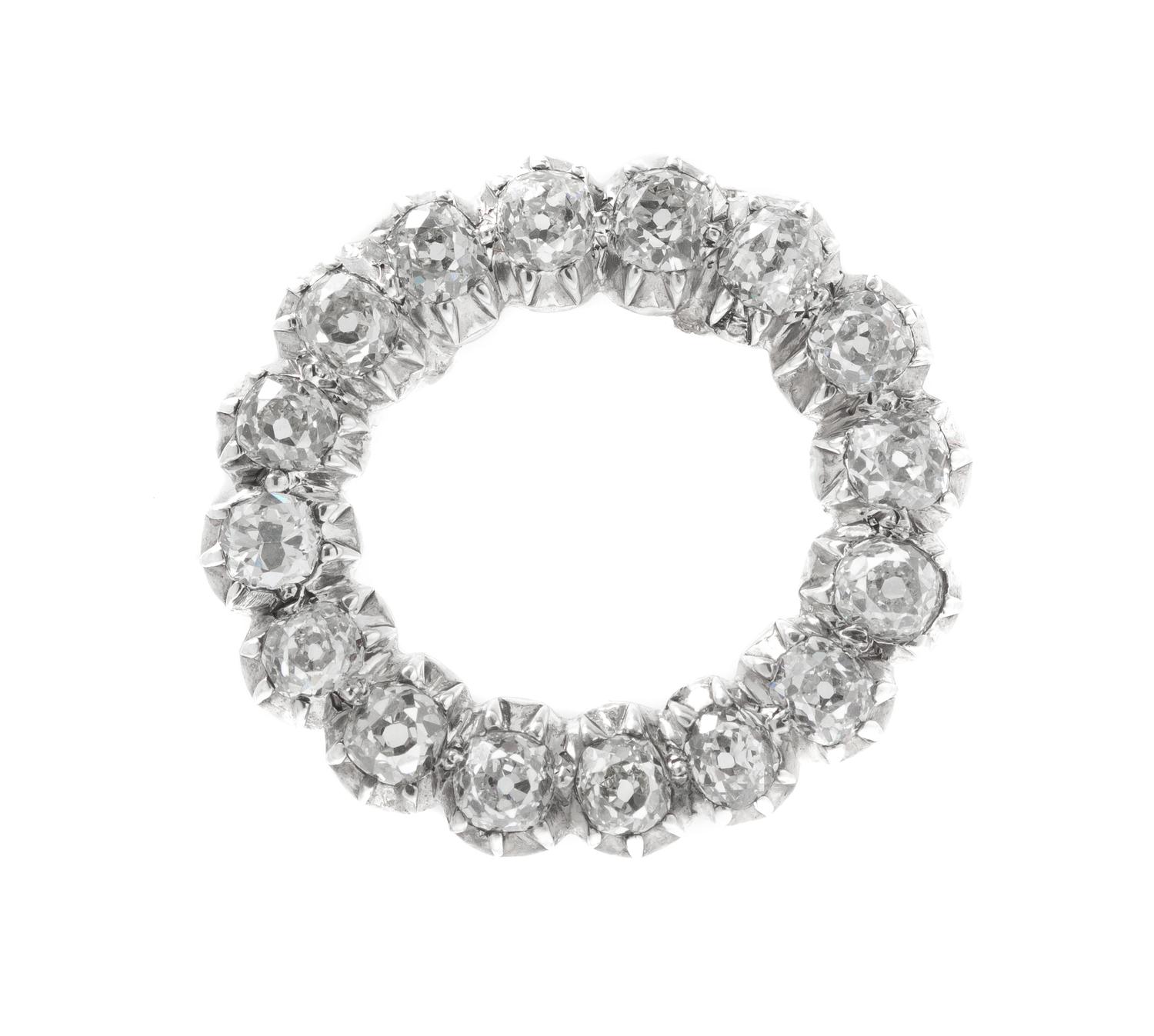 A Silver Topped Gold and Diamond Pendant, 3.20 dwts.