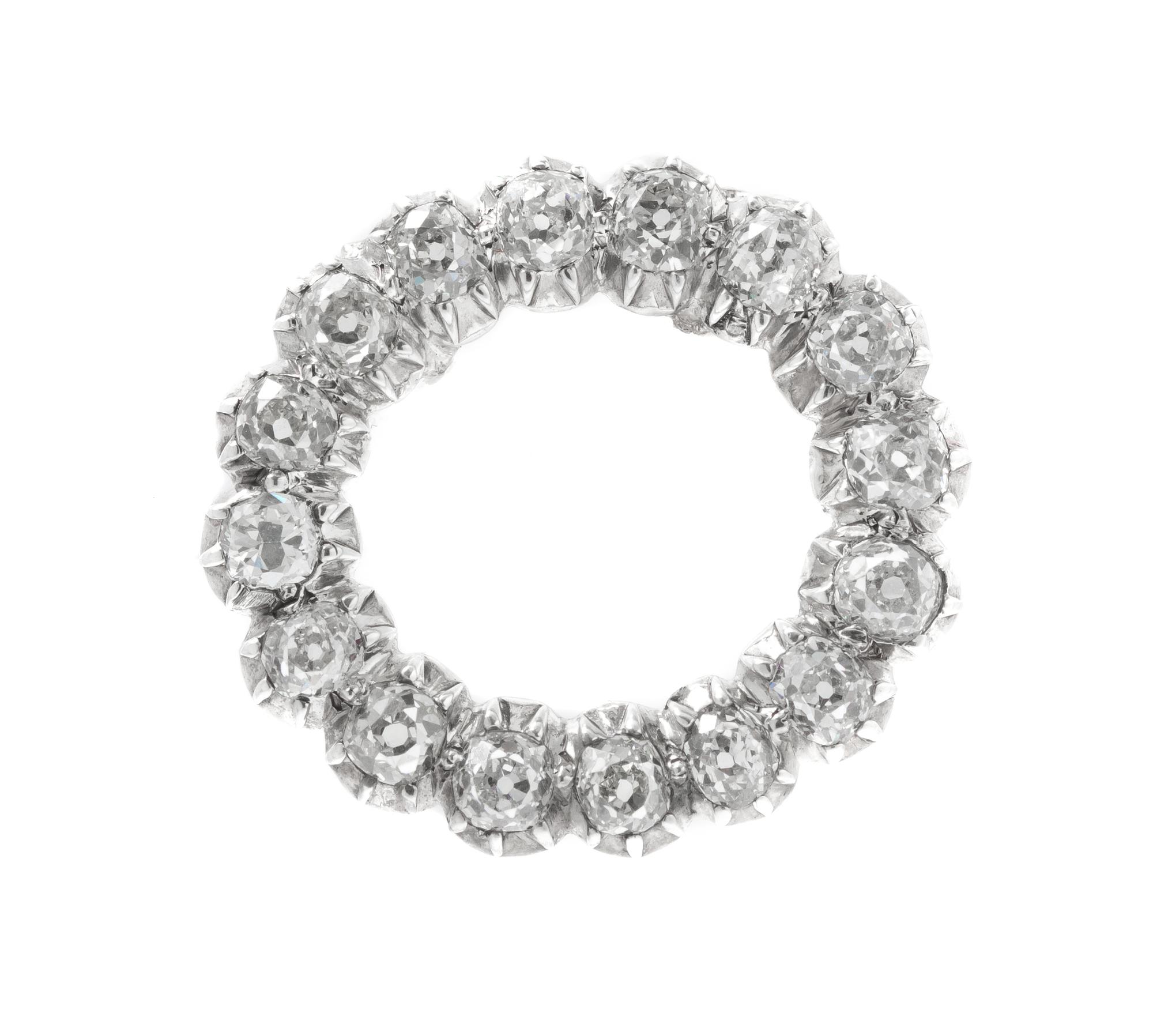 A Silver Topped Gold and Diamond Pendant, 3.20 dwts.