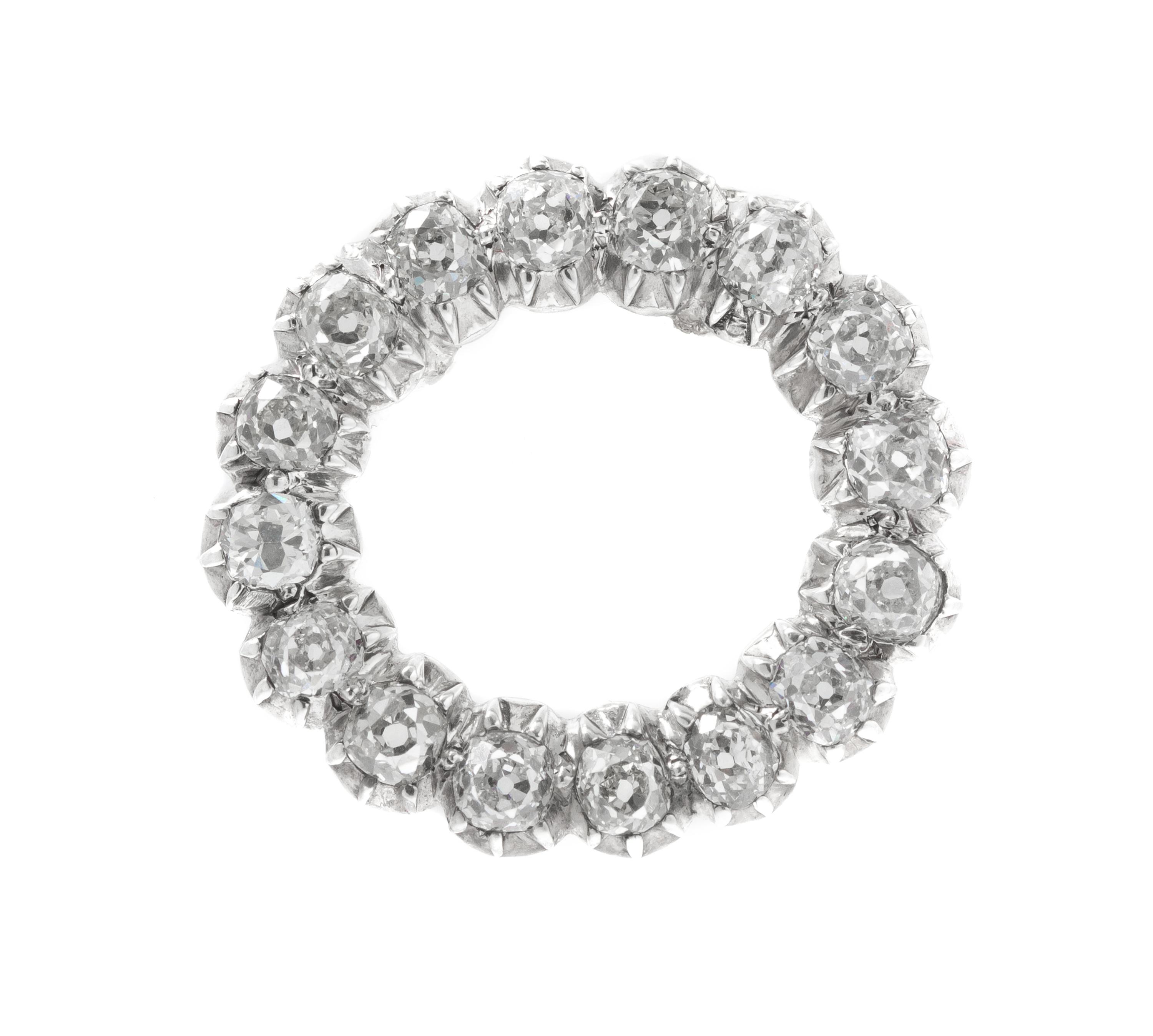 A Silver Topped Gold and Diamond Pendant, 3.20 dwts.