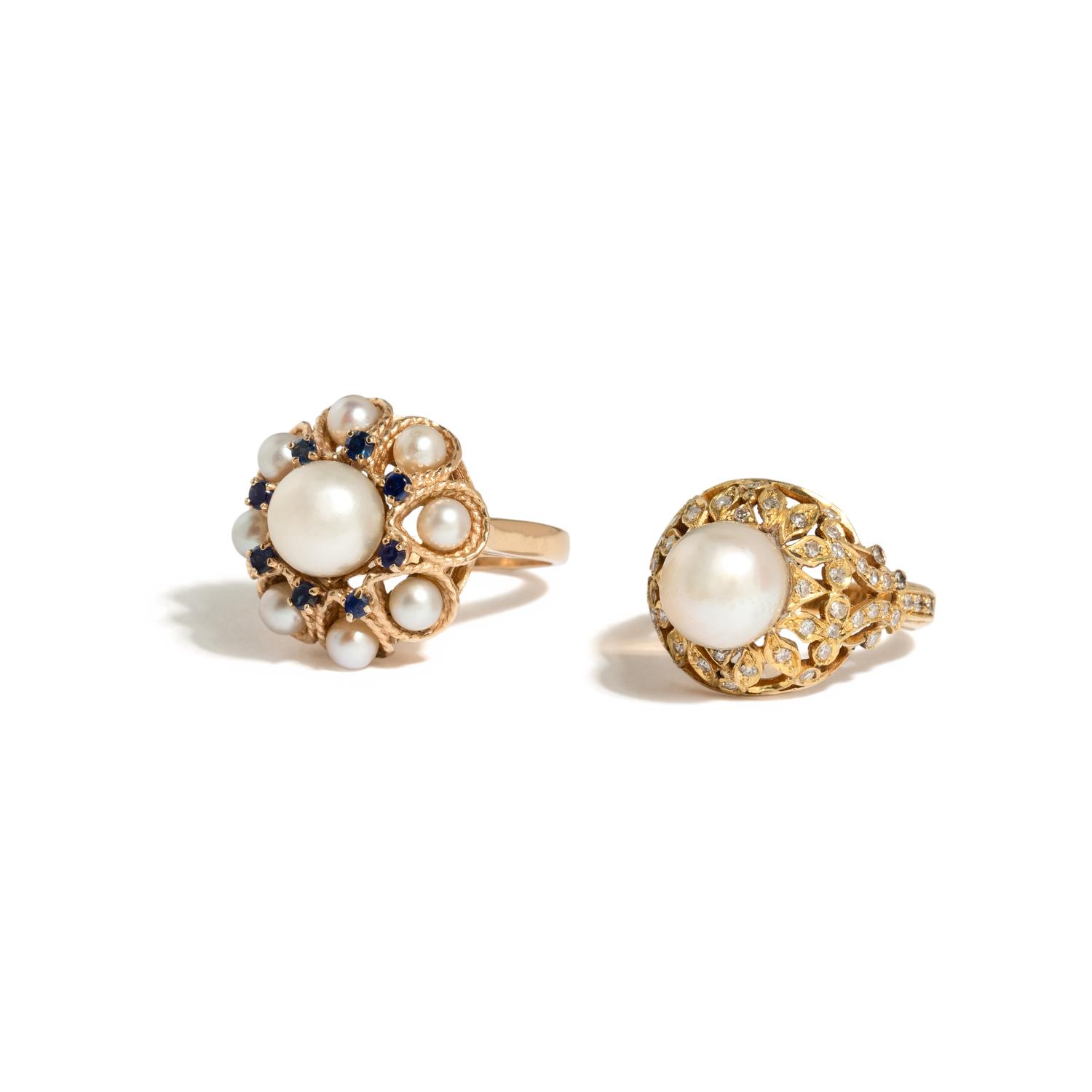TWO YELLOW GOLD AND CULTURED PEARL RINGS