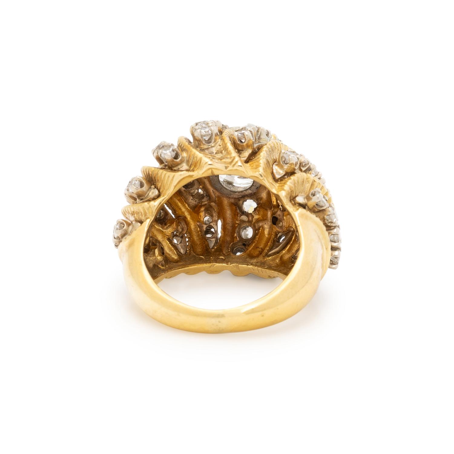 HAMMERMAN BROTHERS, DIAMOND, PLATINUM, AND YELLOW GOLD BOMBÉ RING