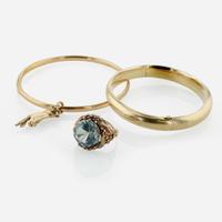 A Collection of Yellow and Rose Gold Bracelets and Ring