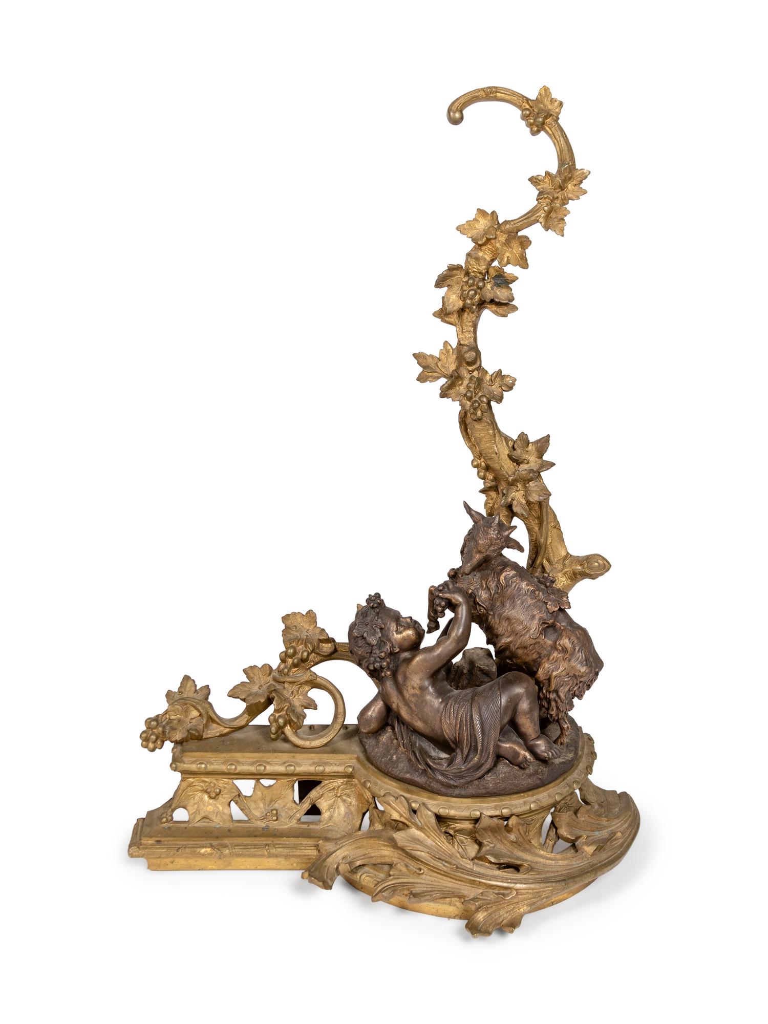 A Pair of Louis XV Style Bronze Andirons with a Fireguard
