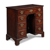 A George II Walnut Kneehole Desk