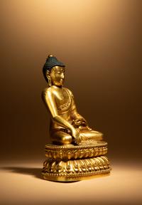 A Gilt Bronze Figure of Shakyamuni Buddha