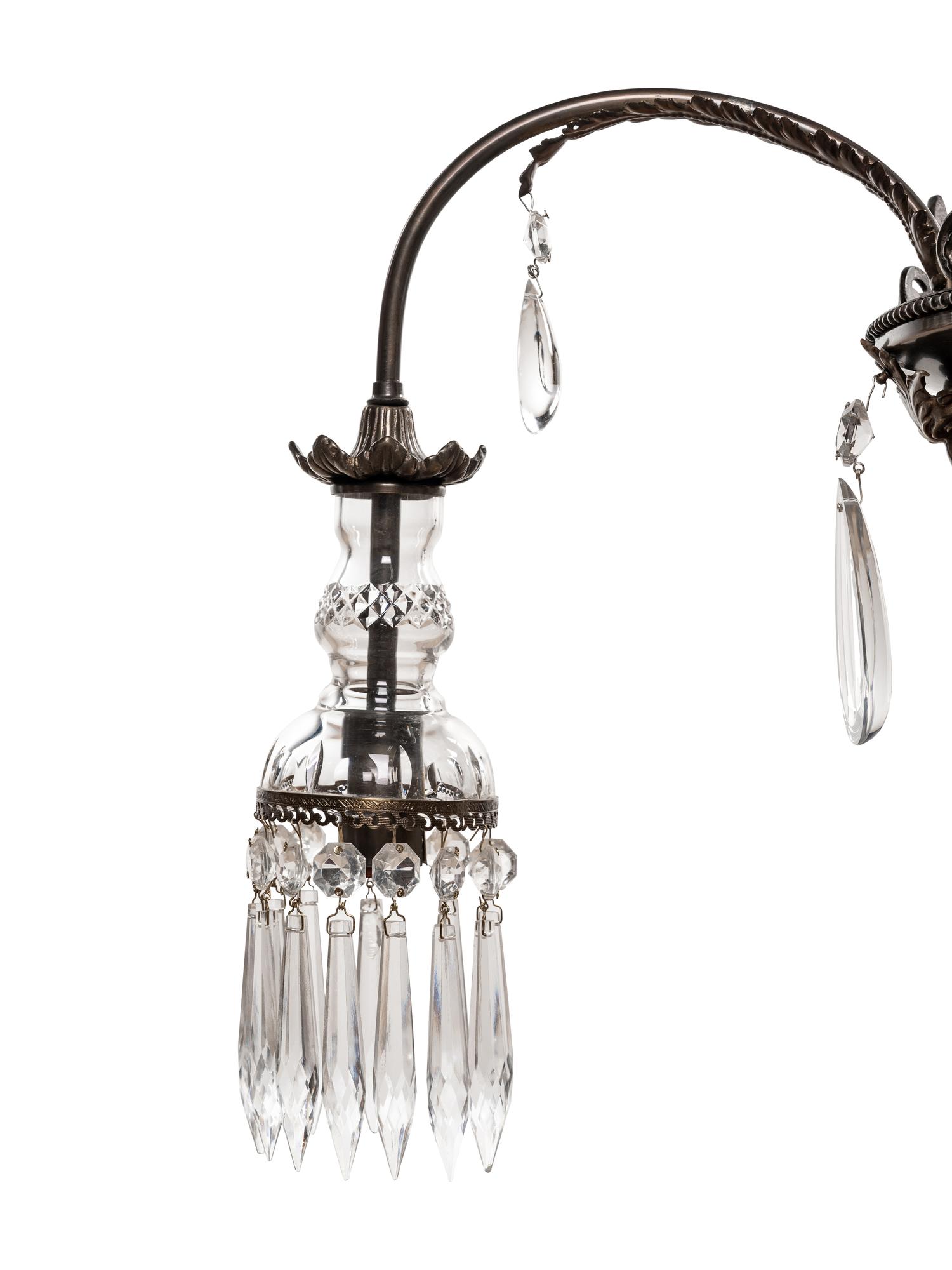 A Continental Bronze and Cut Glass Five-Light Chandelier