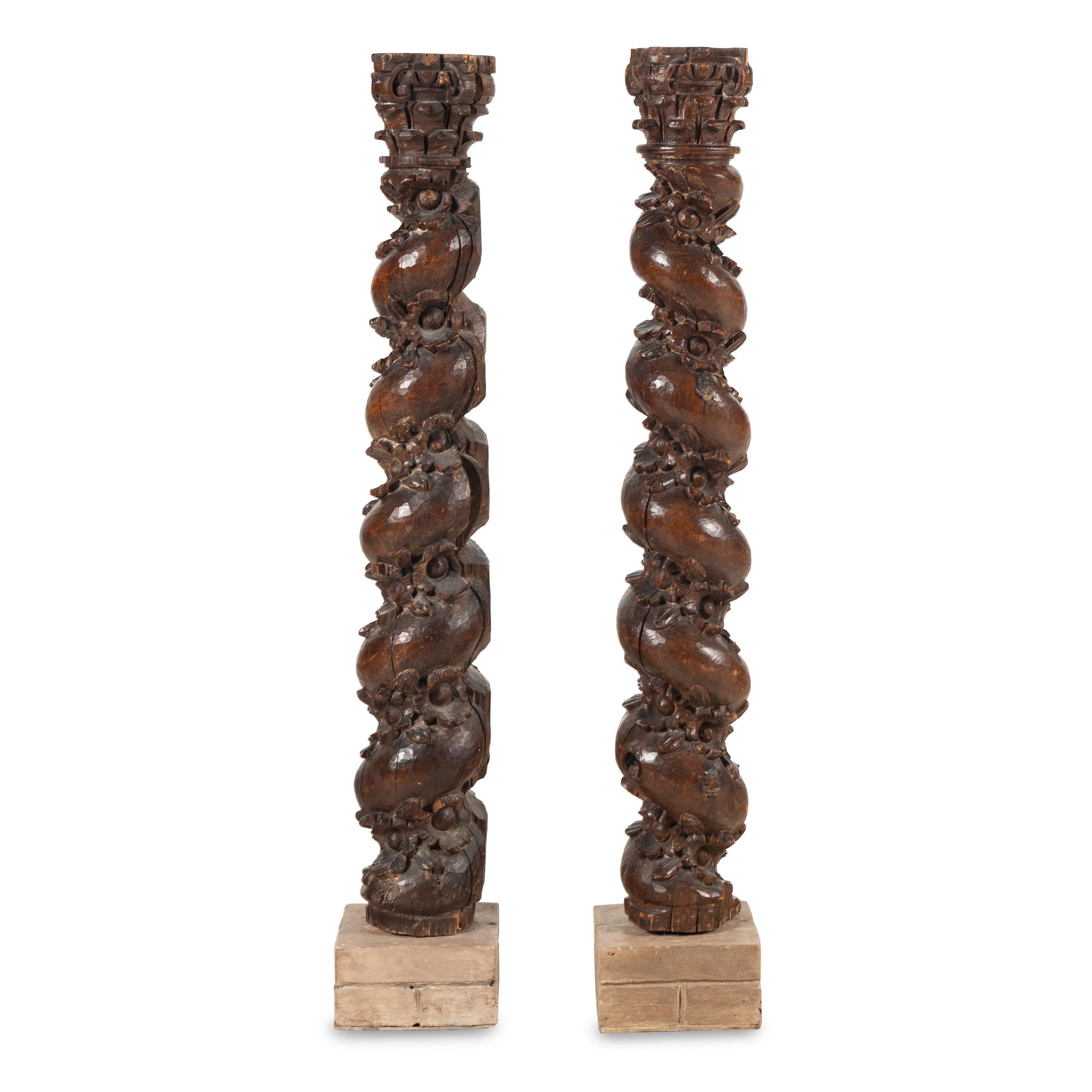 A Pair of French Carved Walnut Solomonic Columns