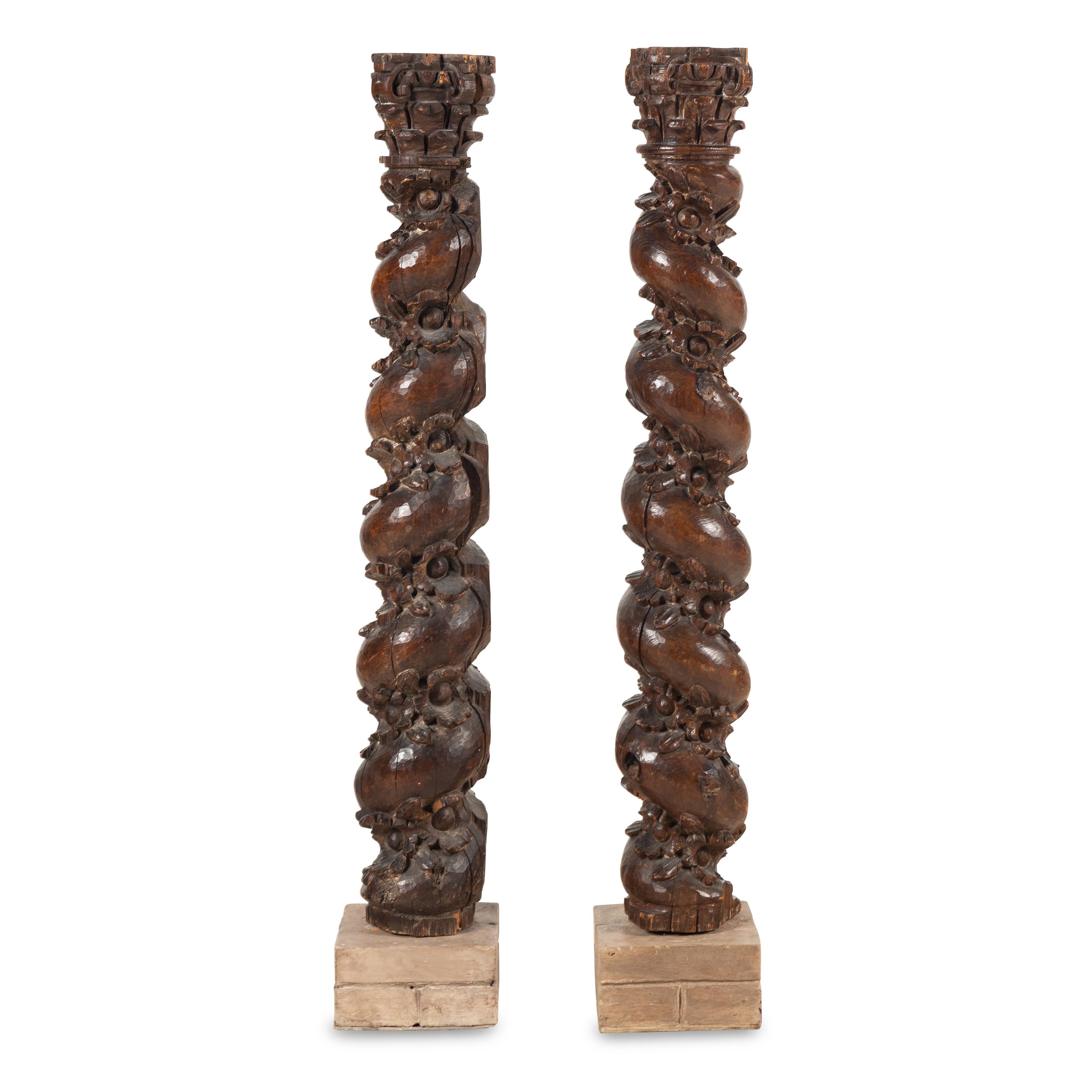 A Pair of French Carved Walnut Solomonic Columns