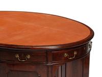An English Mahogany Oval Partners Desk