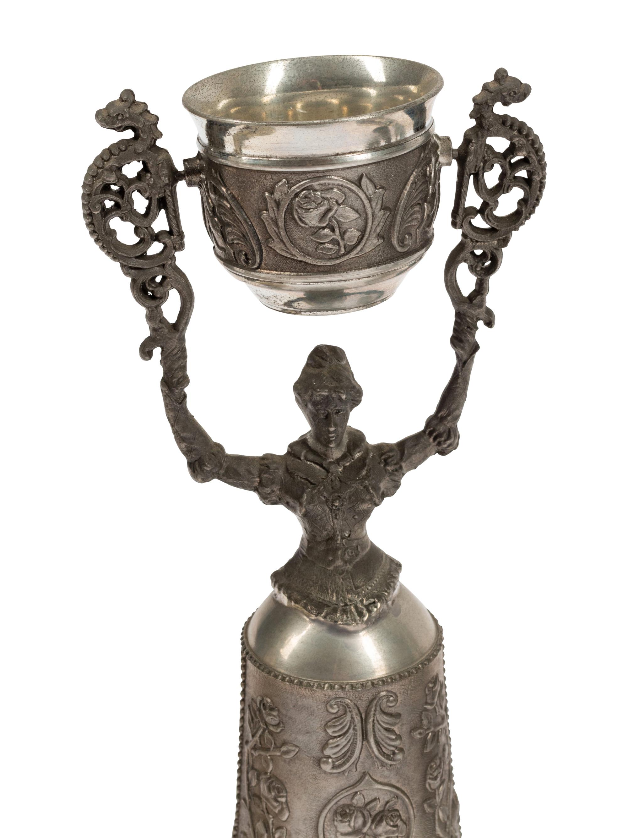 A Group of Six Continental Silver-Plate Wager Cups