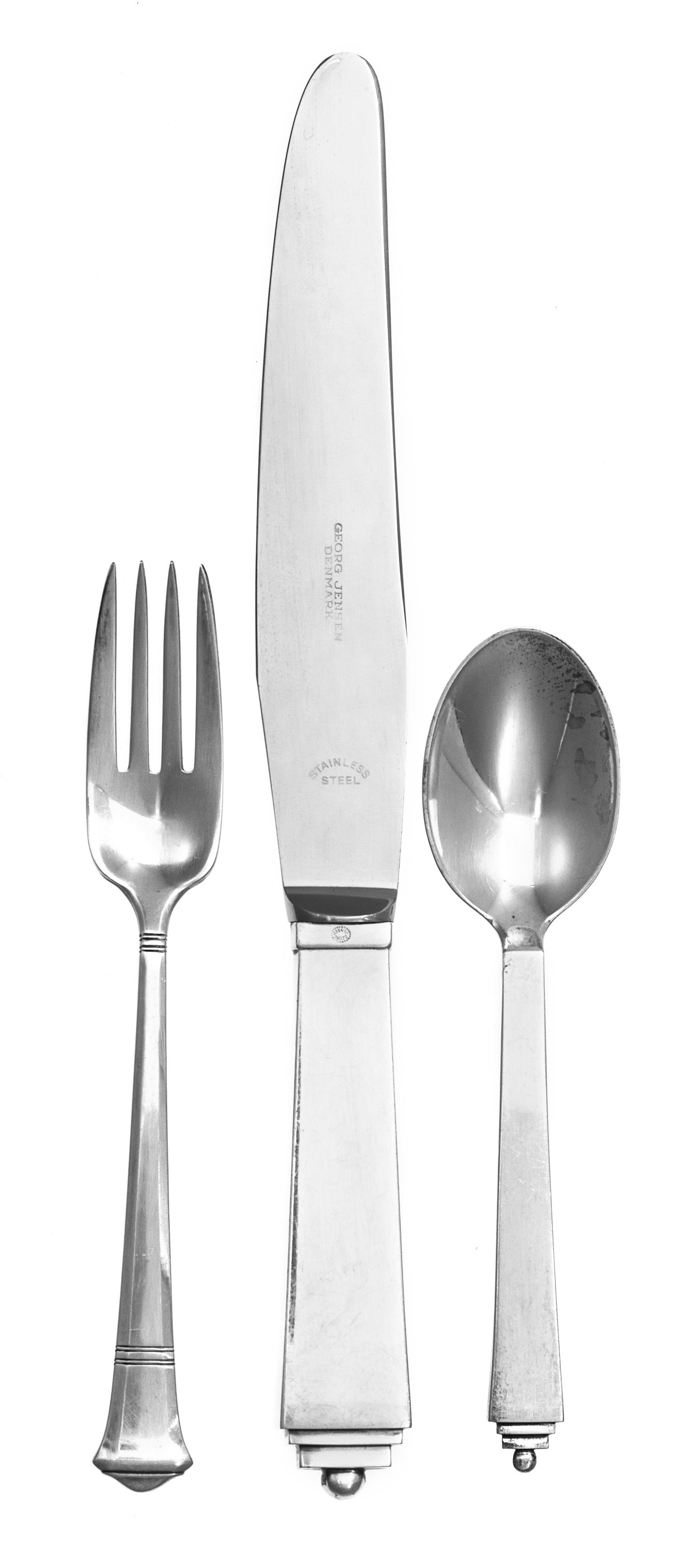 A Danish Silver Flatware Service, Georg Jensen, Copenhagen, Pyramid pattern, comprising: 12 dinner knives 12 dinner forks 12 salad fork