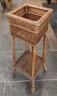 A Rattan Plant Stand Height 31 inches.