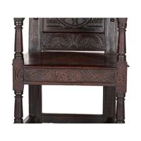 An English Carved Oak and Elm Panel-Back Armchair