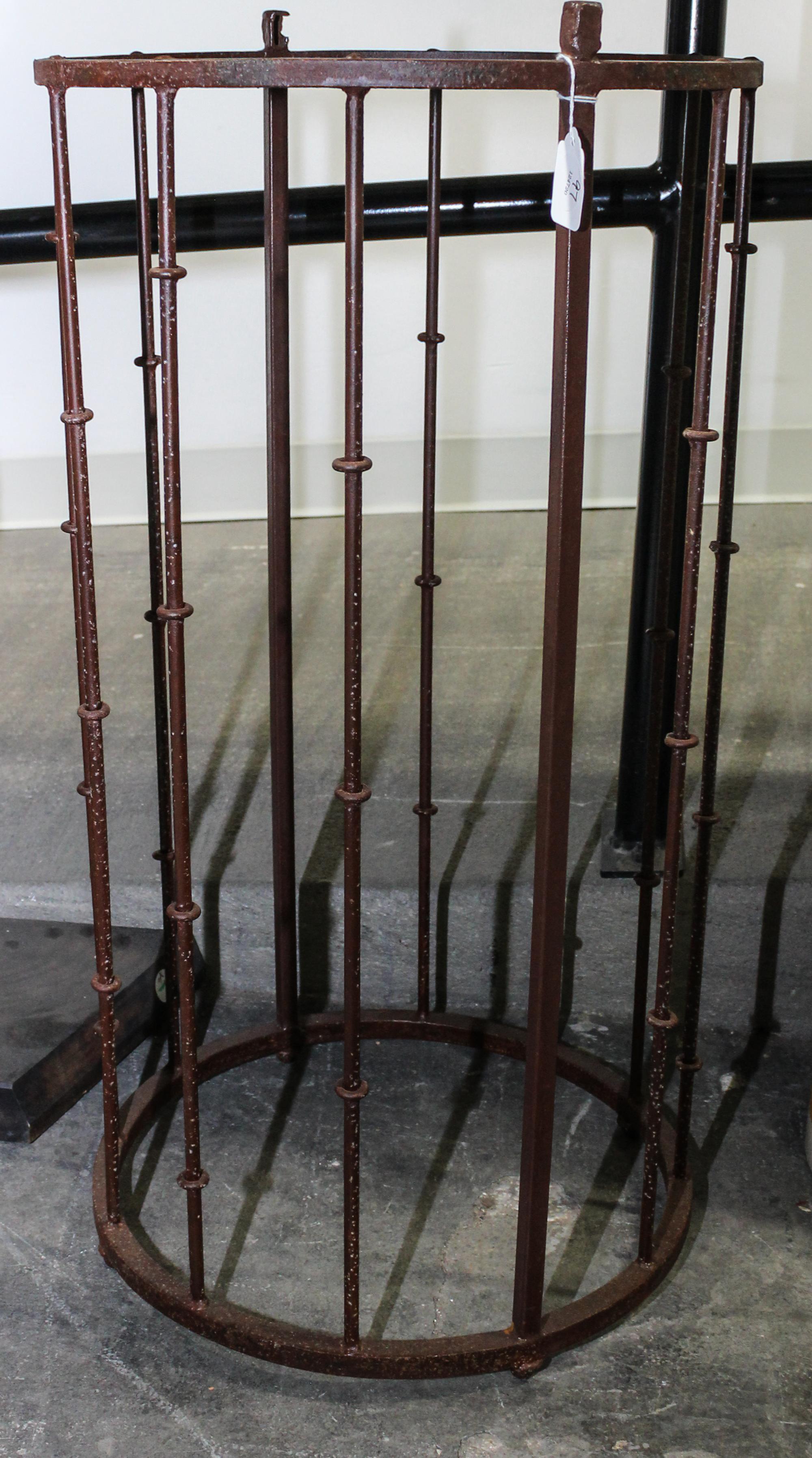 A Wrought Iron Cylindrical Stand Height 29 1/8 inches.