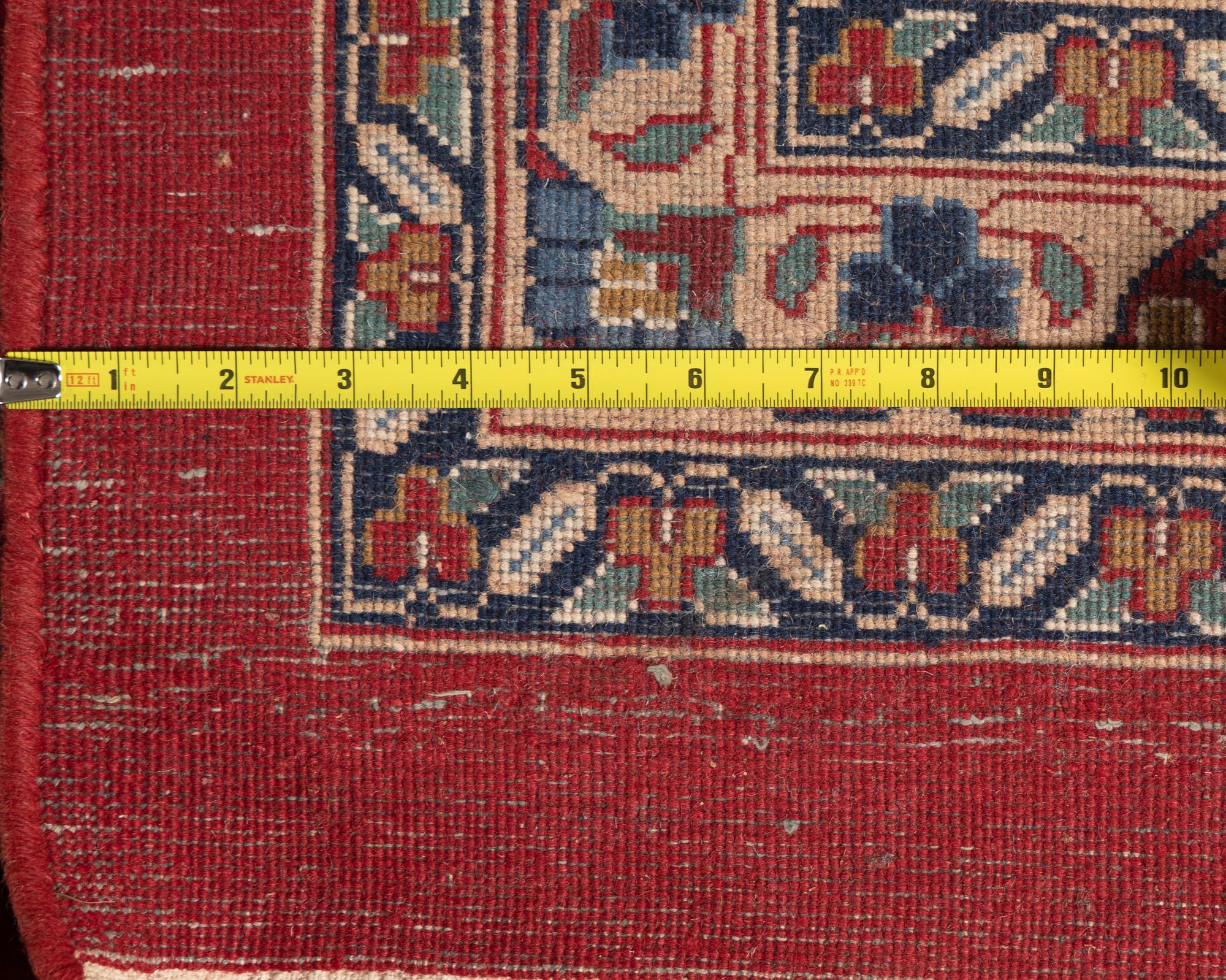 An Isfahan Style Wool Area Rug