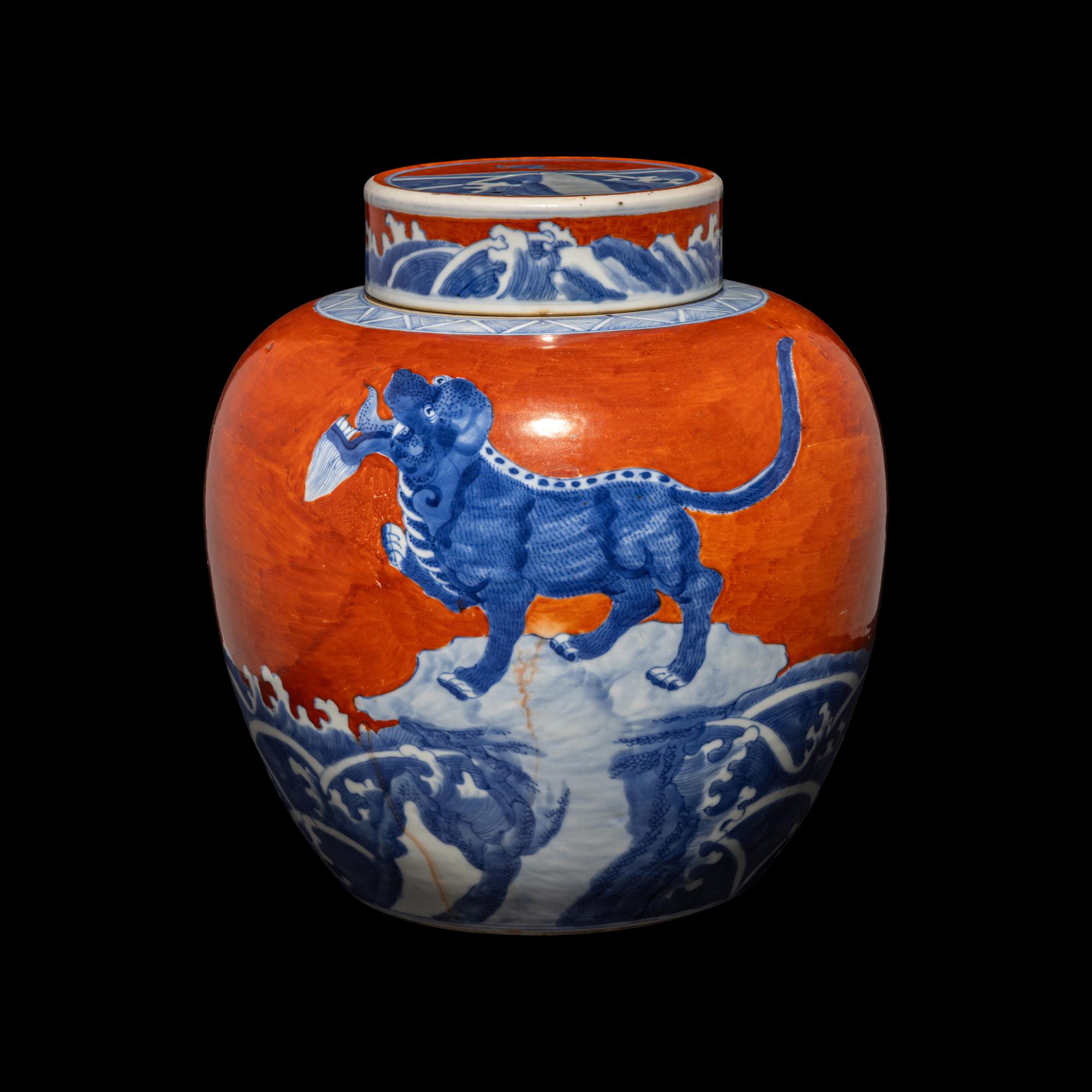 A Chinese Coral-Red Ground Underglaze Blue Porcelain Covered Ginger Jar, 18th Century 清中期 珊瑚紅地青花瑞獸圖蓋罐