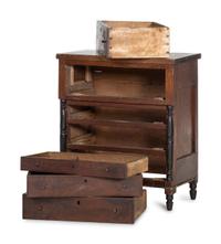 A Late Federal Parcel Ebonized Walnut Diminutive Child's Chest of Drawers