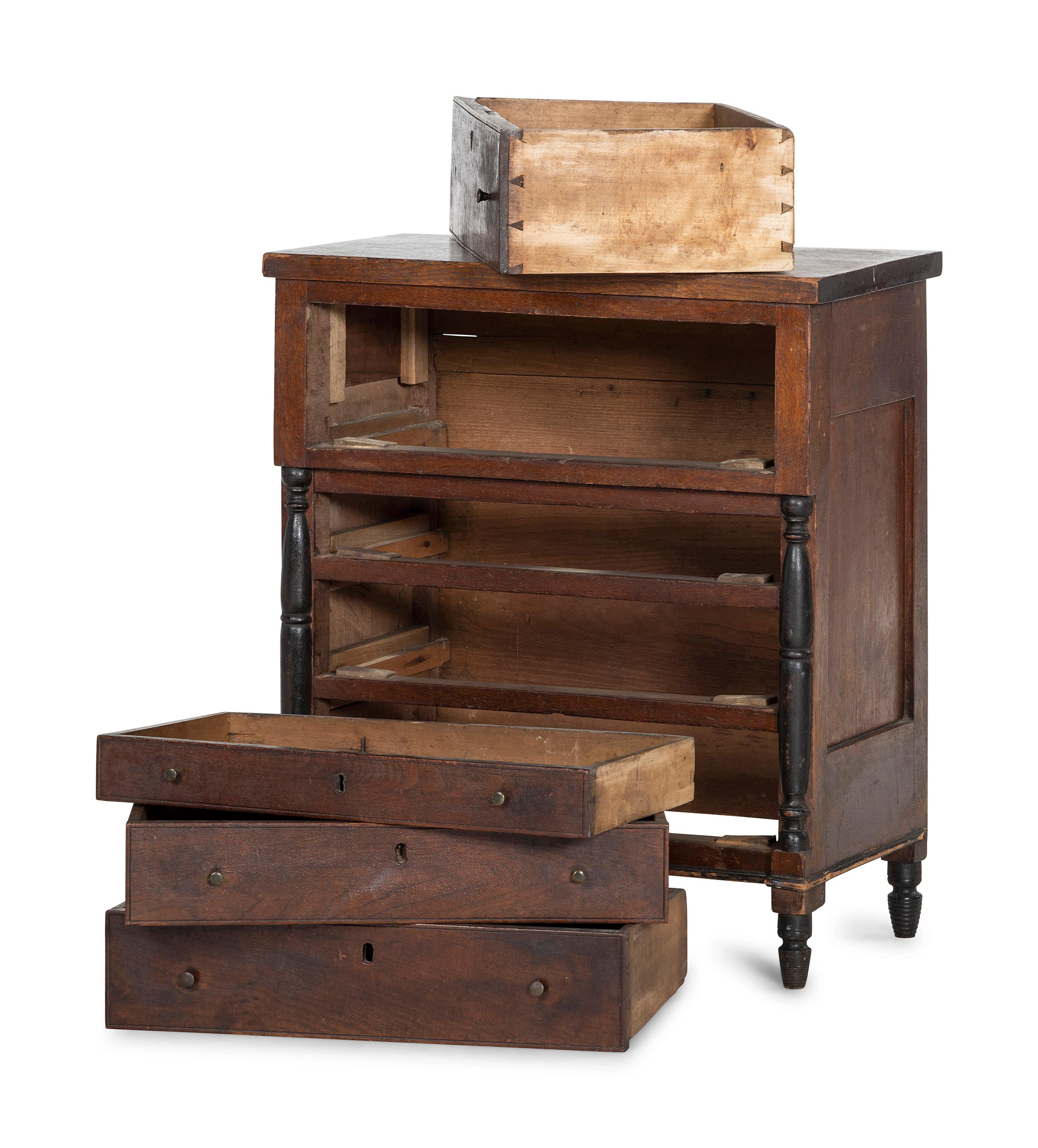 A Late Federal Parcel Ebonized Walnut Diminutive Child's Chest of Drawers